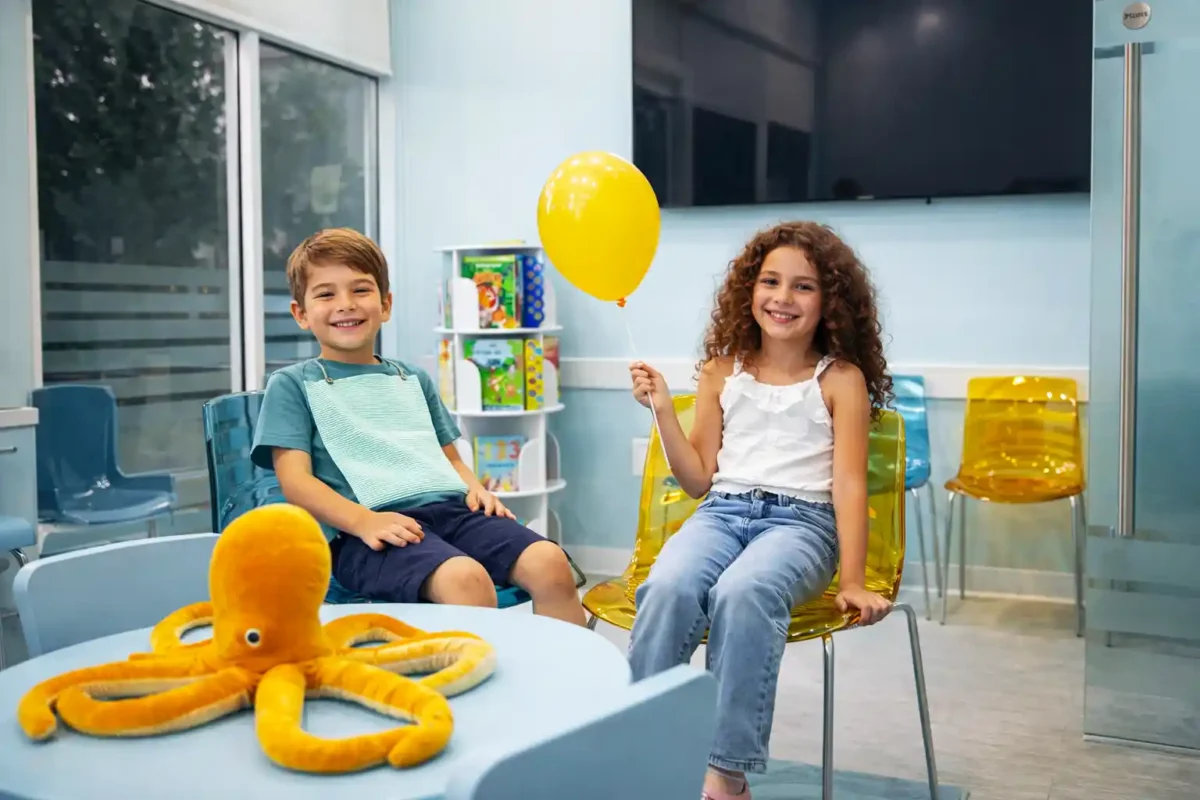 Happy children during their first dental visit at Hello Kids Dentistry Pediatric Dentist in Pembroke Pines