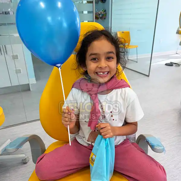 Girl smiling in a kid-friendly pediatric dental office in Pembroke Pines Florida
