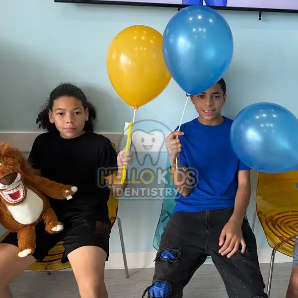 Happy young patient enjoying a positive dental visit at Hello Kids Dentistry